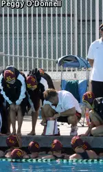 The top-ranked Trojans prep for defense of their 2013 national championship.