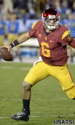 Cody Kessler rolls out of the pocket in USC's rivalry game versus UCLA.