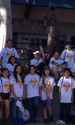 Students from 32nd Street School visit Dedeaux Field.