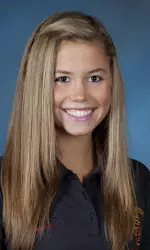 USC freshman midfielder Alex Moore scored three goals and had an assist in the Trojans' 11-10 upset of No. 13 Stanford.