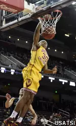 Elijah Stewart dunks against the San Diego Toreros.