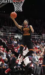 Elijah Stewart goes up for a lay up on a fast break.