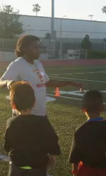 Mandy Freeman teaches South Los Angeles children the fundamentals at a recent clinic.