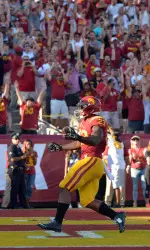 Sep 19, 2015; Los Angeles, CA, USA; Tre Madden (23) scores on a 5-yard touchdown run in the first quarter. Credit: Kirby Lee-USA TODAY Sports