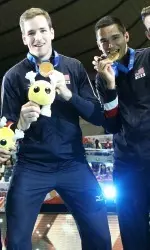 Murphy Troy (left) and Micah Christenson with their World Cup gold medals.