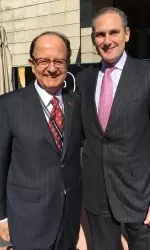 USC President Max Nikias (left) with Pac-12 Commissioner Larry Scott at today's CFP meeting.