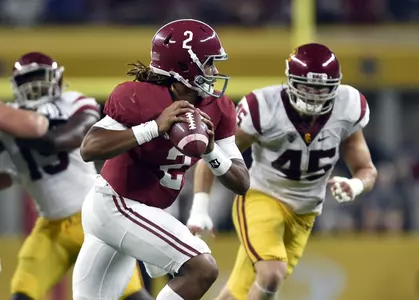 Sep 3, 2016; Arlington, TX, USA; Alabama Crimson Tide quarterback Jalen Hurts (2) looks to pass as USC Trojans defensive end Porter Gustin (45) defends during the first half at AT&T Stadium. Mandatory Credit: Jerome Miron-USA TODAY Sport