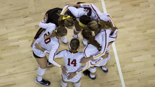 Aerial team huddle Galen Center