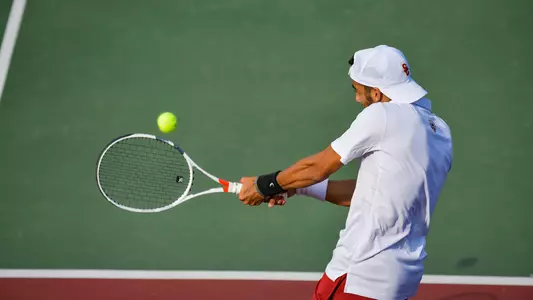 Daniel Cukierman swings in a match against Texas