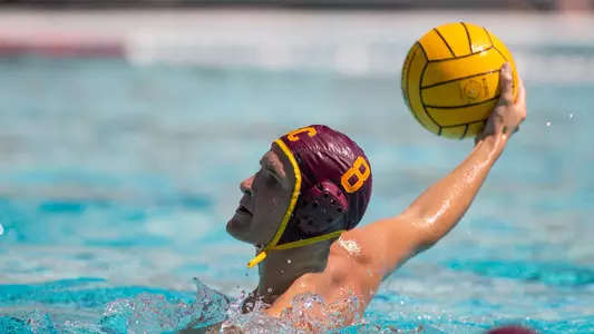 Jake Ehrhardt looks to pass in a home game at Uytengsu.