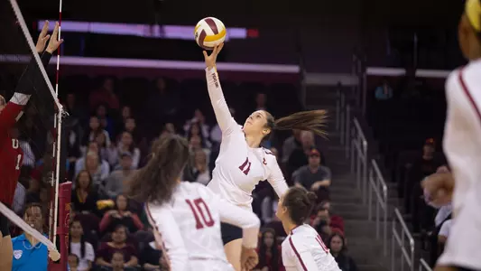 USC women's volleyball junior middle blocker Jasmine Gross attacks the ball.