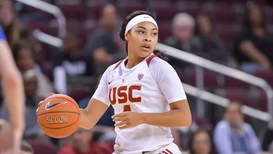 Mariya Moore brings the ball up the court in USC's home opener.