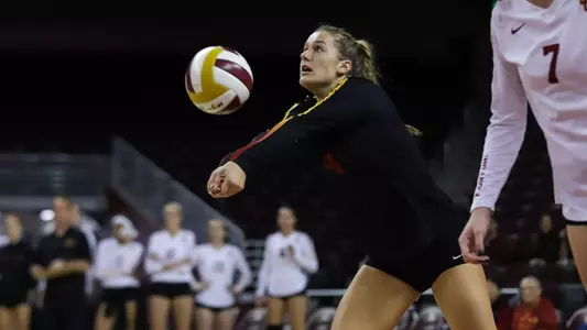 Women's Volleyball senior libero Victoria Garrick sets a ball