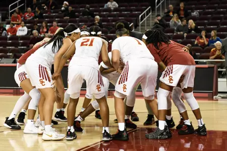 The USC women huddle up before a home game at Galen Center.