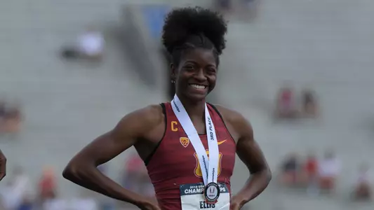 Kendall Ellis with USATF 3rd Place Trophy