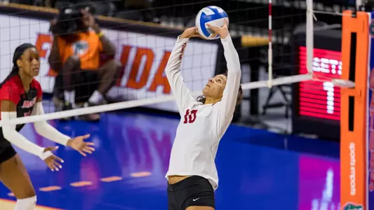 Raquel Lázaro puts up a set against Louisville in the Bubly Invitational.