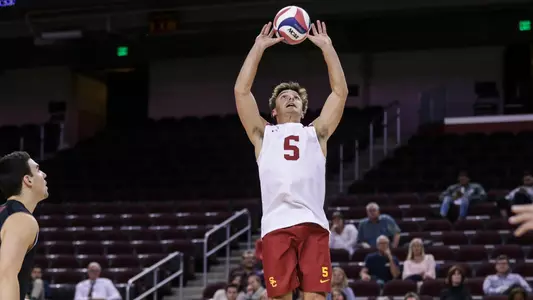 After the setter digs the first contact, libero Matt Douglas moves in to set the ball.