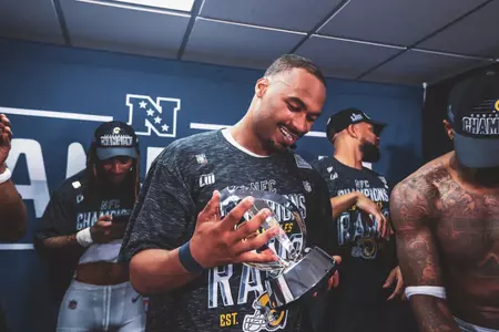 Robert Woods holds NFC Championship Trophy