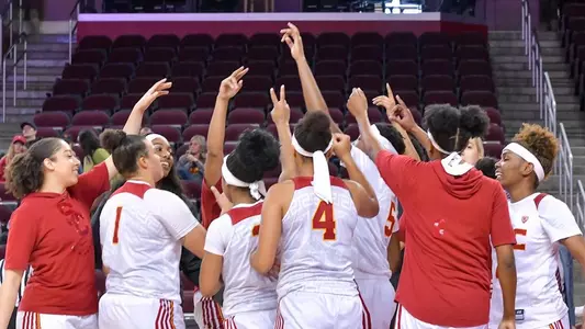 The team huddles up before a game at Galen Center