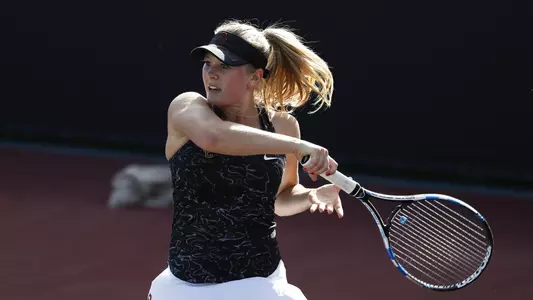 Sydney Van Alphen follows through on a forehand swing.