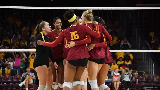 Team huddle Galen Center