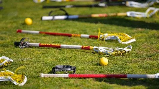 USC lacrosse sticks and balls on McAlister Field