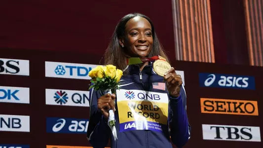 Dalilah Muhammad holds gold medal