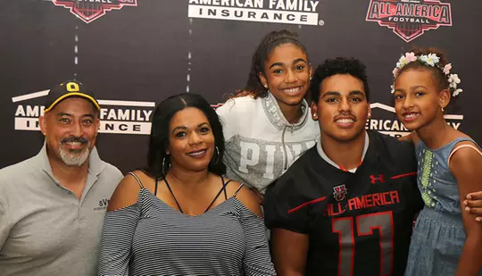 Alijah Vera-Tucker with mom, stepdad and sisters