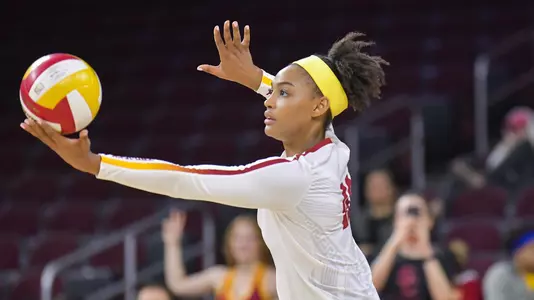 Khalia Lanier serves the volleyball
