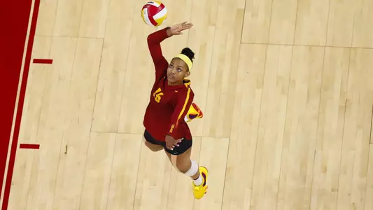 Khalia Lanier serves the volleyball