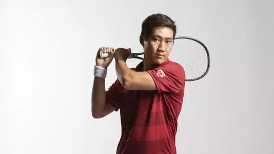 Rae Lan takes a practice swing in a photo shoot at USC.