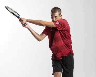 Ryder Jackson follows through on a practice shot during a photo shoot