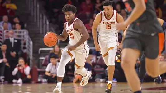 Ethan Anderson brings ball upcourt