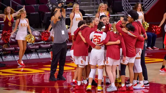The USC team huddles up before taking the court vs. UNLV