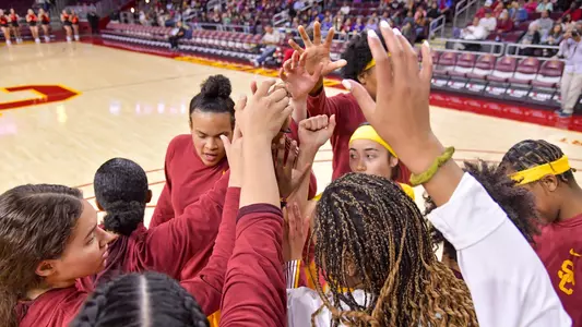 USC huddles up before a win over Long Beach State at Galen Center