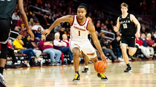 Kyle Sturdivant drives against LBSU
