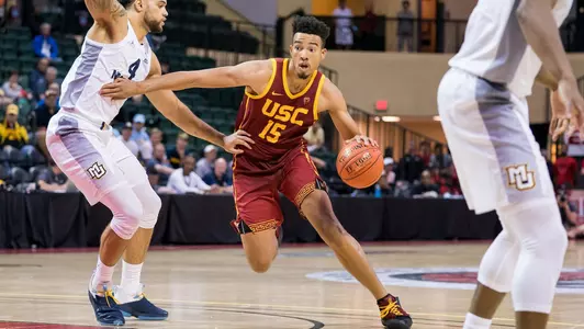 Isaiah Mobley drives against Marquette