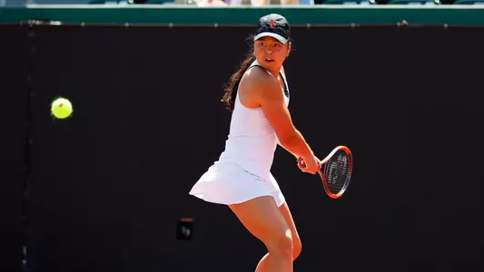 Rianna Valdes prepares for a double-handed backswing.