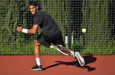 Daniel Cukierman fires a shot between his legs