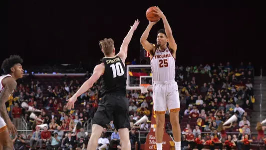 Bennie Boatwright pulls up for a jumper against Colorado's Alexander Strating on Saturday, February 9, 2019.