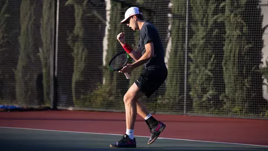 Brandon Holt celebrates a point in a match vs. UCLA at Marks Stadium