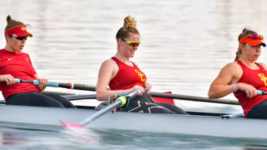 Radka Novotnikova, Chloe Brew and Marliis Reinsert row the boat.
