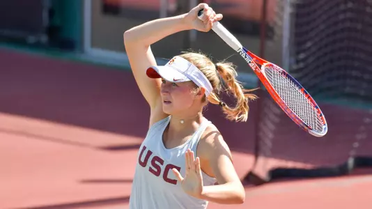 Danielle Willson follows through on her forehand swing.