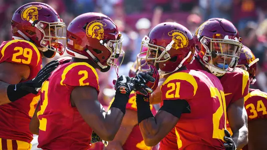 USC Trojans Football wide receivers Devon Williams and Tyler Vaughns celebrate with teammates