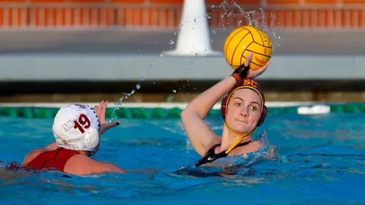 Maud Megens looks to pass in a game at Uytengsu Aquatics Center.