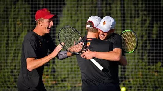 Tanner Smith, Laurens Verboven and Jack Jaede celebrate at Marks Stadium.