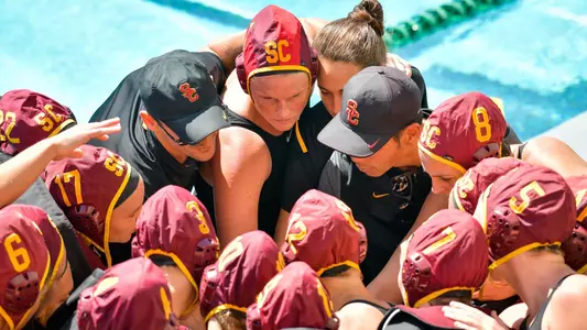 The team huddles up before a game at Uytengsu Aquatics Center