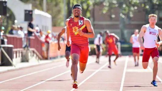 Eric Allen Jr. Sprinting with baton