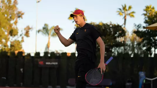 Riley Smith celebrates a point won during his clinching victory vs. UCLA