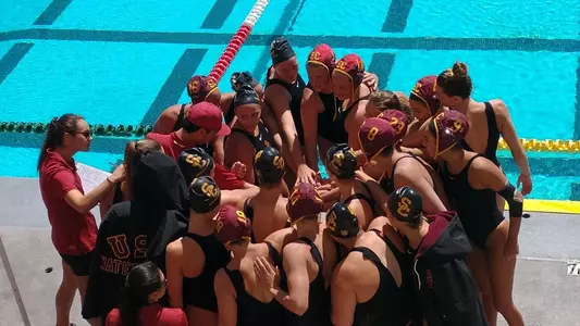 The team huddles up before a game at Uytengsu